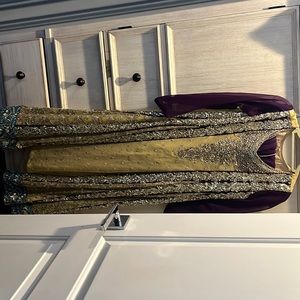Purple dress with gold and silver work. Size small. Perfect for any occasion